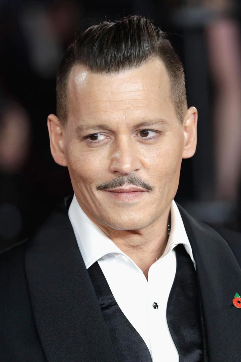 johnny depp as clip on earrings; a thread