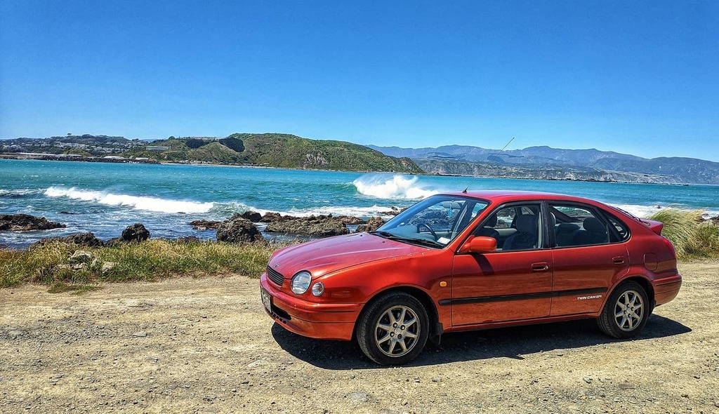 LikePetrol's tweet photo. It's such a stunning day today I thought I'd treat the newly woffed #corolla #ae112r for a decent drive. Bit windy on the south coast, but what a day! #wellington #summer #toyota https://t.co/9HDes7QOzL https://t.co/xcsxpH5JGJ
