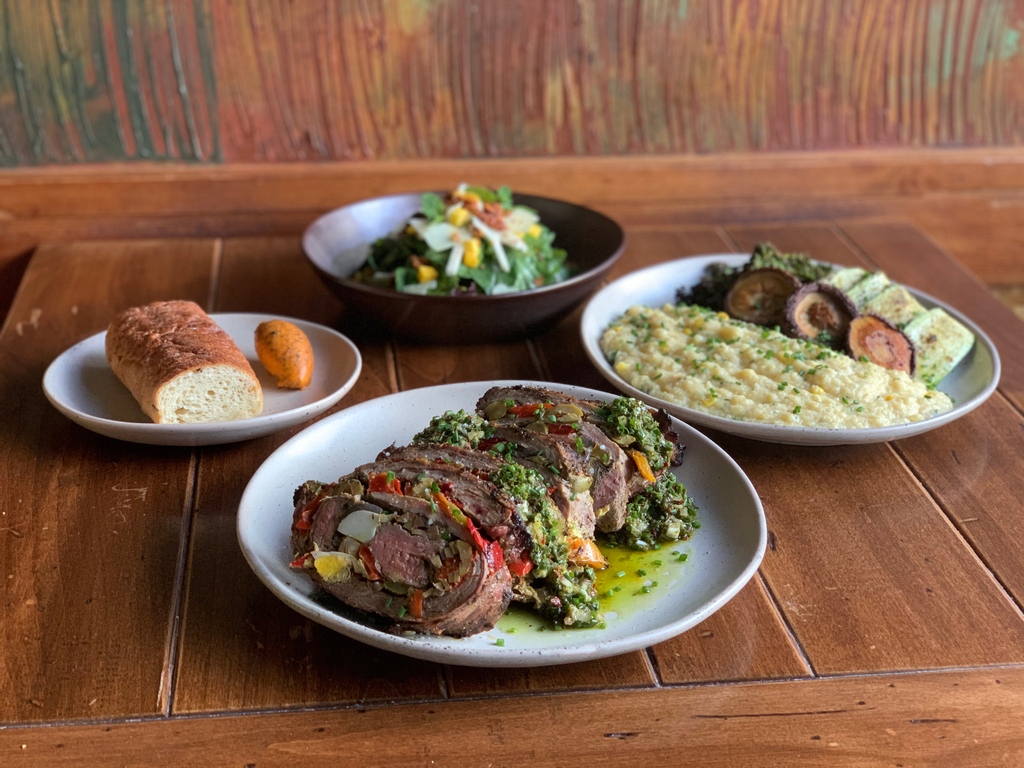 One of this week's dinner kits is the Matambre.  This traditional Argentine rolled stuffed steak features marinated flank rolled around onions, peppers, olives, chorizo, hard boiled eggs and fresh herbs. Served with salad, veggies and bread.