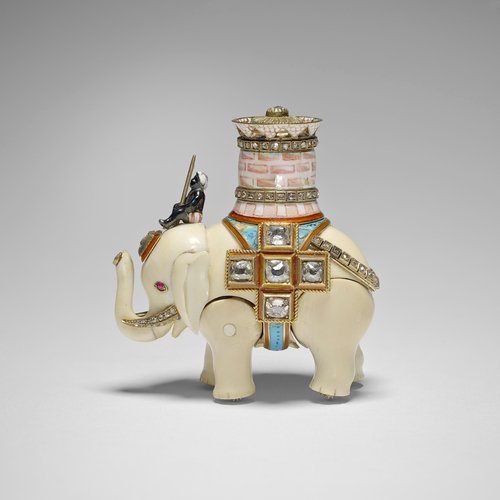 The surprise was an automaton of an elephant in ivory. It was the first automaton made by Fabergé for an Imperial egg.The elephant had special significance; the design resembles the badge of the highest order in Denmark, Empress Maria Feodorovna's homeland.