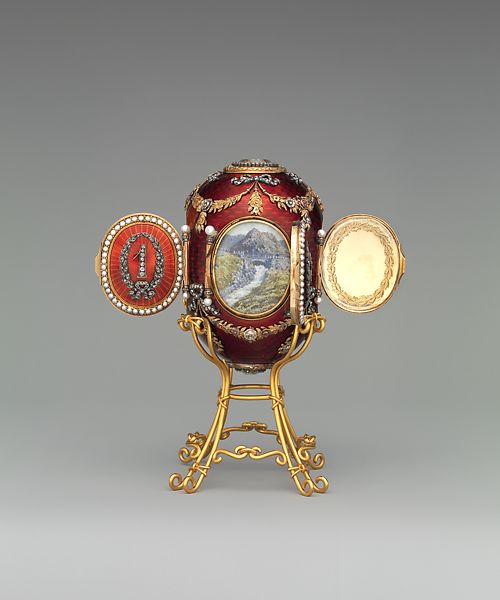 It commemorates Abastumani in Caucasus where Grand Duke George spent most of his life after being diagnosed with tuberculosis. Miniatures were done and signed by Krijitski. The miniatures are revealed by opening four pearl-bordered doors around the egg.