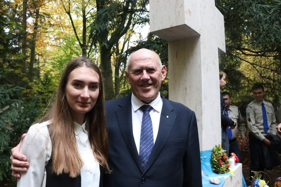 Olya Sydii from Lviv is the information and propaganda officer for the OUN-B's Youth Nationalist Congress (MNK), pictured here with int'l OUN-B leader Stefan Romaniw () at Stepan Bandera's grave in Munich last year for the 50th anniversary of his death. Likely an OUN-B member.
