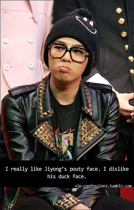 G-dragon makes this pouty duck face ; a thread