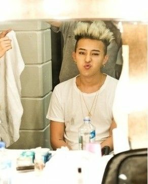G-dragon makes this pouty duck face ; a thread