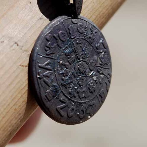offshoreoddity's tweet photo. Happy 12 days of #Oddmas! Day 3: A silver 2007 medal I found on a yacht club beach. They modeled it after the middle portion of the Minoan Phaistos Disk. I have no idea why. #WyrdWednesday @WyrdWednesday https://t.co/wXNvZhENBO