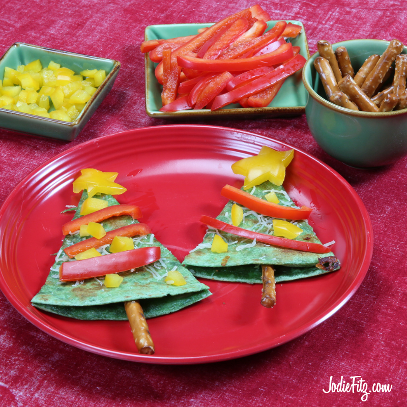 JodieFitz's tweet photo. Got kids?  Do they like quesadillas? If the answer is yes, check out this recipe.  These are made with spinach wraps, mozzarella cheese and pesto; so easy.  Wash, slice and dice a few peppers &amp; create an even yummier and festive mix.  https://t.co/gzddvBvibB https://t.co/FUQTFQR0Qk