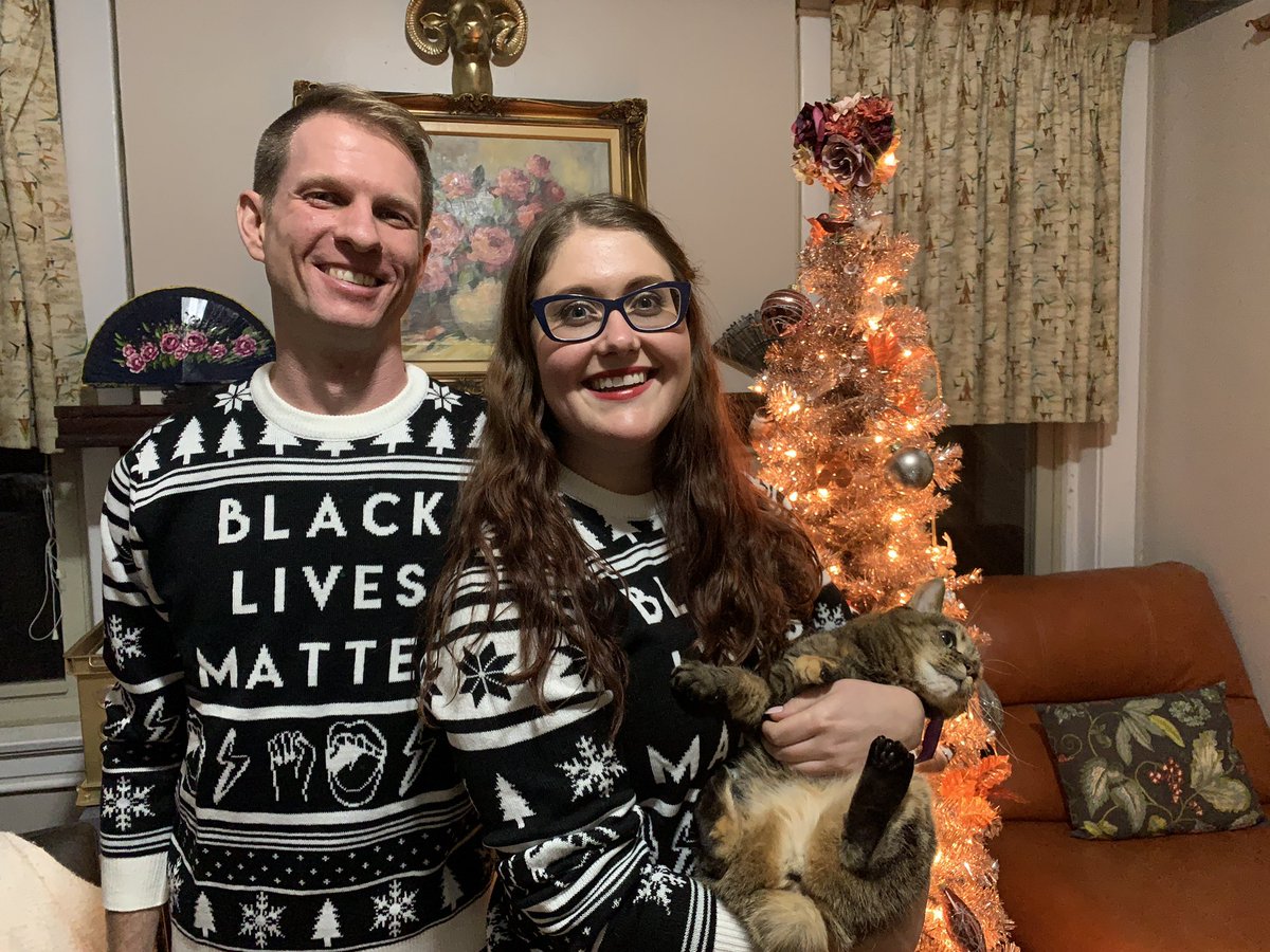 Lauren Miller, EdD (@lifebynumber) on Twitter photo Happy holidays from <a href="/SACKETTBW/">Brandon Sackett</a> and I! Thank you to <a href="/CoriBush/">Cori Bush</a> for sharing this amazing sweater from <a href="/its_the_outrage/">The Outrage</a>. #ChristmasJumperDay #BlackLivesMatter @BLMIINC Happy holidays from <a href="/SACKETTBW/">Brandon Sackett</a> and I! Thank you to <a href="/CoriBush/">Cori Bush</a> for sharing this amazing sweater from <a href="/its_the_outrage/">The Outrage</a>. #ChristmasJumperDay #BlackLivesMatter @BLMIINC