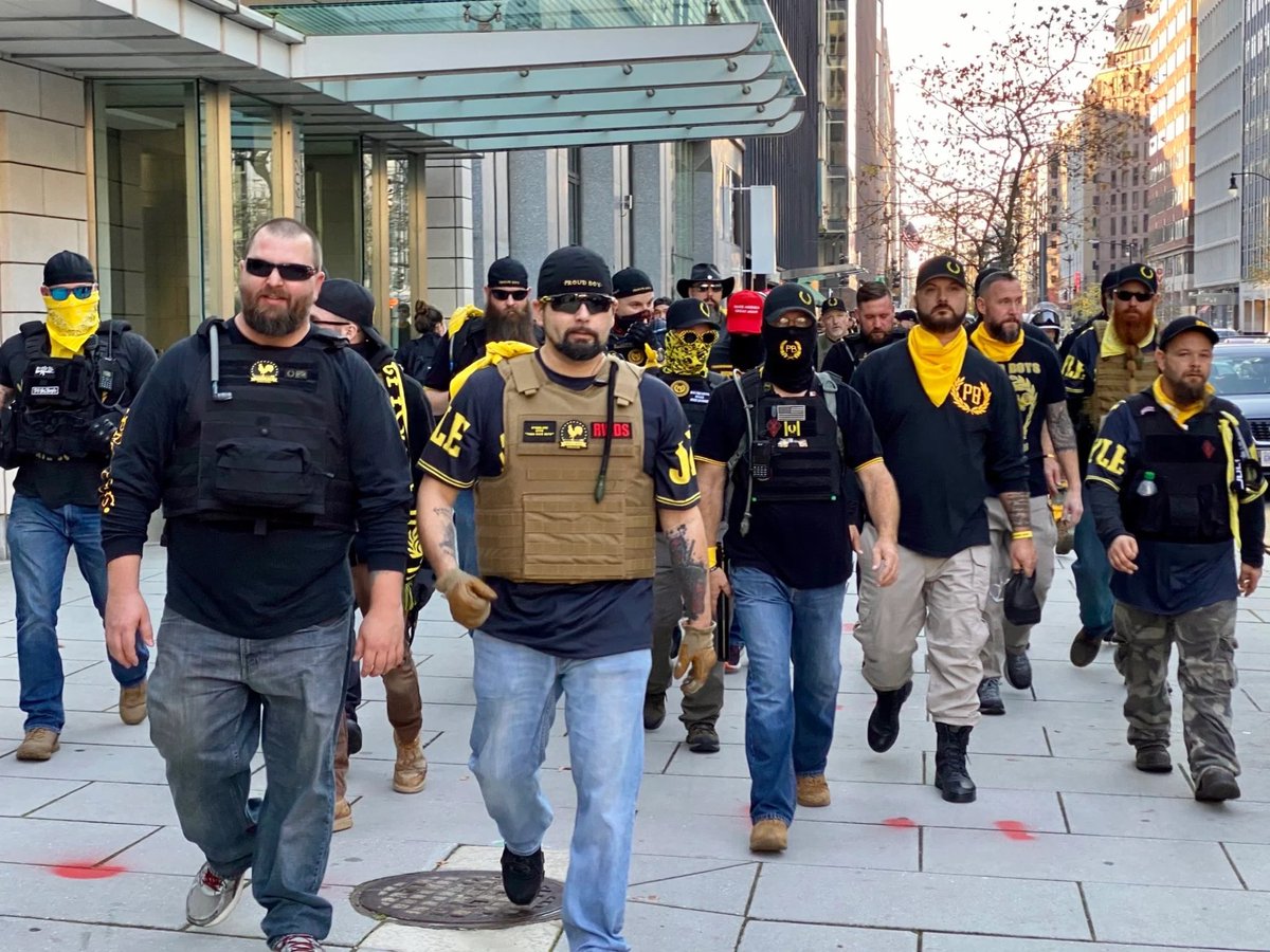 Tymills's tweet image. If the so called “Proud Boys” were there to “peacefully” protest, why do they need to dress up like a bunch of fake ass soldiers with bulletproof vests? What a bunch soft ass bitches. #ArmyOfNone