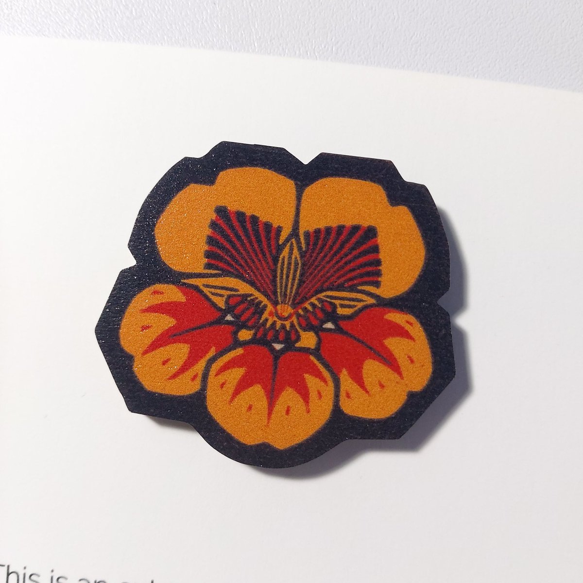 esmumse's tweet photo. In love with my new brooch from @Badgical 🧡🖤 https://t.co/6LUjlkLNgp