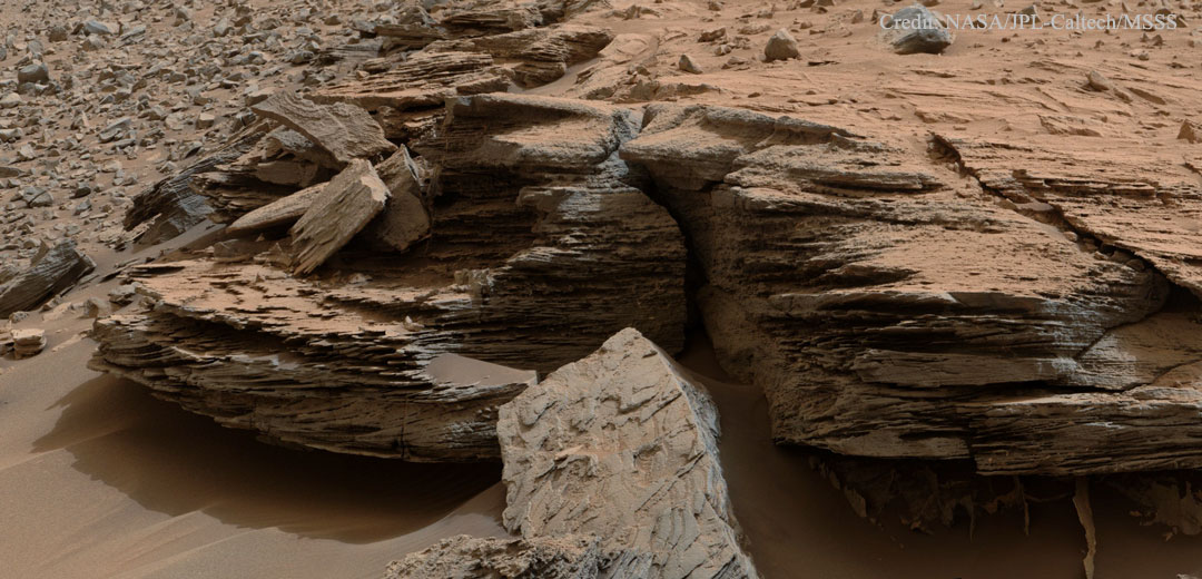 AsgardiaSpace's tweet photo. Just a picture of a one-meter wide layered Whale Rock which is part of the Pahrump Hills outcrop at the base of #MountSharp on #Mars. The image was taken by @MarsCuriosity rover. Photo credits: @apod @NASA @NASAJPL https://t.co/rvaEdyVcAe