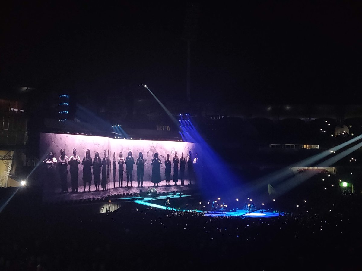 Or maybe it was just the extreme dissonance of watching Bono pay tribute to a fascist minister, whose government was—AT THAT EXACT MOMENT—shooting and assaulting students and peaceful protesters in the nation's capital. It was just too much. I ran out of the stadium.