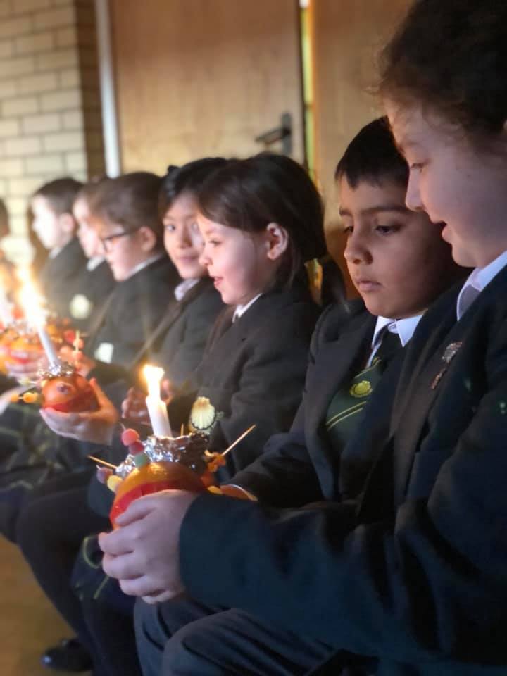 CHRISTINGLE | Yesterday we held a very beautiful Christingle Service in our Markham Hall. #ChristmasatStJames #ChristingleService