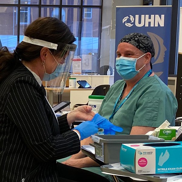 UHN's tweet photo. Nine months after #COVID19 was declared a global pandemic, @UHN was the site of a historic moment as five long-term care workers became the first healthcare workers in Canada to be vaccinated against the coronavirus.

Read more → https://t.co/S8ED9yFwVK https://t.co/UrOP853pBs