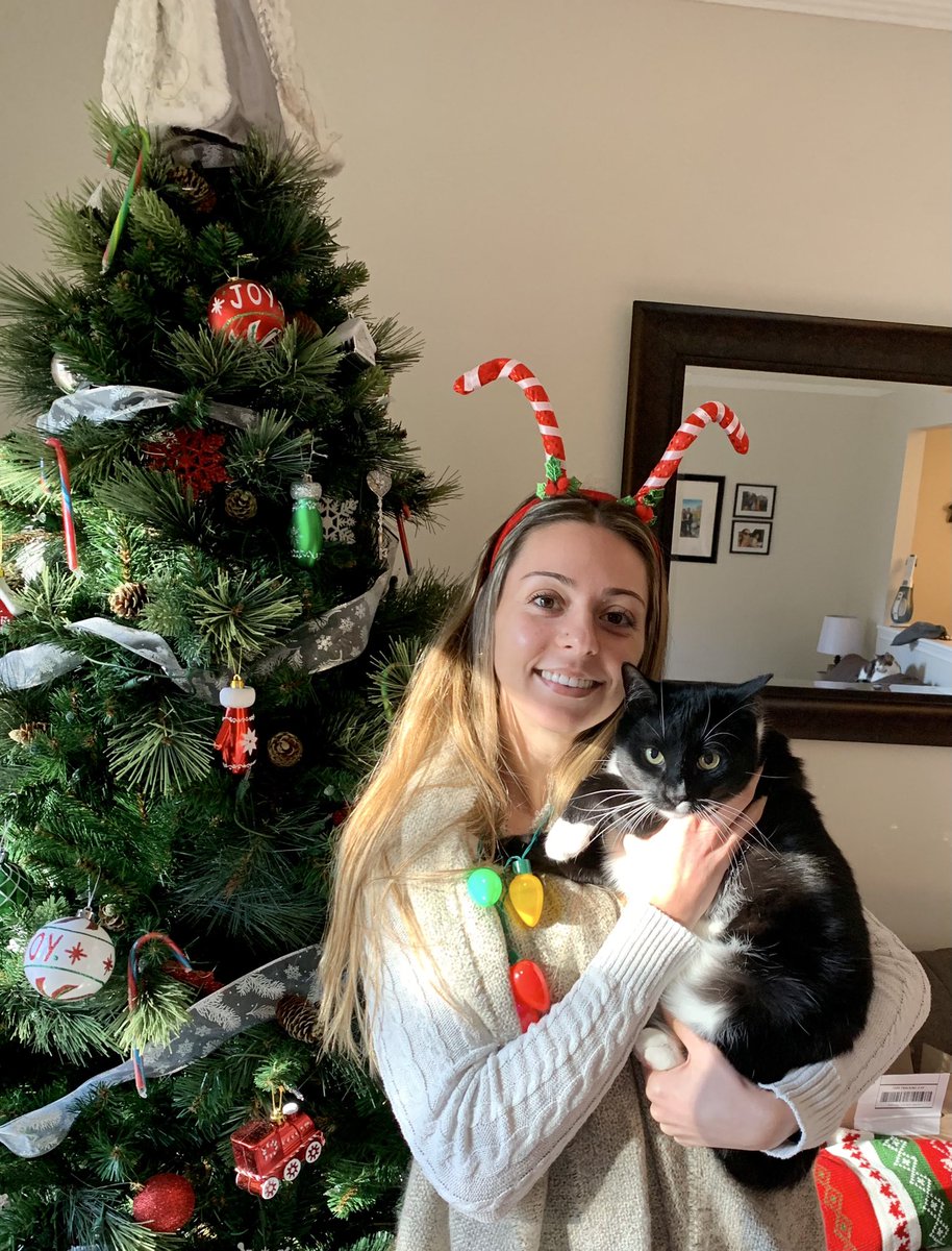 Crazy holiday hat day with my fed up cat 🤣 can you spot cat #2?! #winterspiritweek <a href="/colgan_sca/">Colgan SCA</a> <a href="/colganhs/">Colgan High School</a>