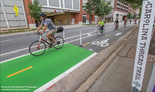Sustain_CLT's tweet photo. BREAKING NEWS: City Council has unanimously approved a $4.1 Million contract to construct a critical part of the Uptown Cycle Track on 5th and 6th St between McDowell St and the Blue Line light rail! Huge thanks to all of you who have supported our #iBikeCLT efforts since 2016! https://t.co/ErWyX1NS3o