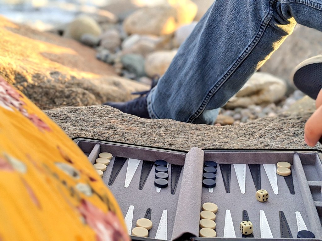 Backgammon- Under $20 This is our go to having a picnic or hanging at the beach game. There is a little more luck mixed in with die rolls though.Strip variant if your partner rolls double 6s THEY take an item off. If you're getting pounded you can at least enjoy the view ;)