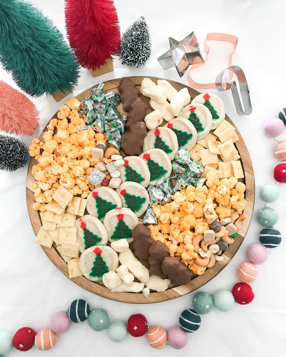 All we want for Christmas is Angie's BOOMCHICKAPOP ❤️🎄 How creative are these charcuterie boards, made with our Sweet and Salty popcorn? ❄️🍿 @_itstheprettythings_ @jennpargeon @thedobieckifam