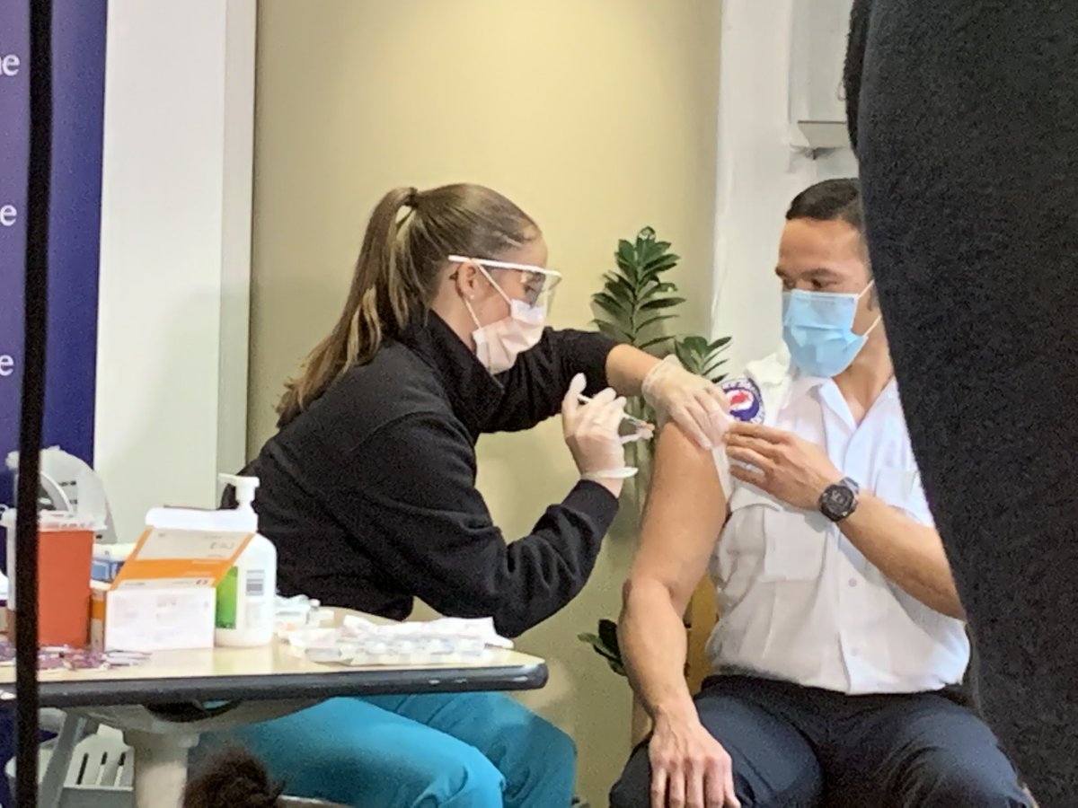 Alan Goto, an  @SeattleFire paramedic, receives the inoculation. “I feel privileged to be here today,” Goto says. Adds that “we never really know” how much exposure paramedics have to COVID. “We respond to 911 calls - a very common complaint is respiratory difficulty.”
