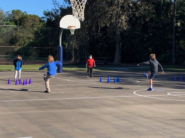 FOOT Bowling! Ss work with a partner to kick a small Hoop towards 6 cones. After 2 tries, they add up their points and upright the cones, with their feet, to set up the game for the next player. #Sociallydistanced #Physed #nohands @MitchHoffman_AP @PrincipalLCE @aschneider36