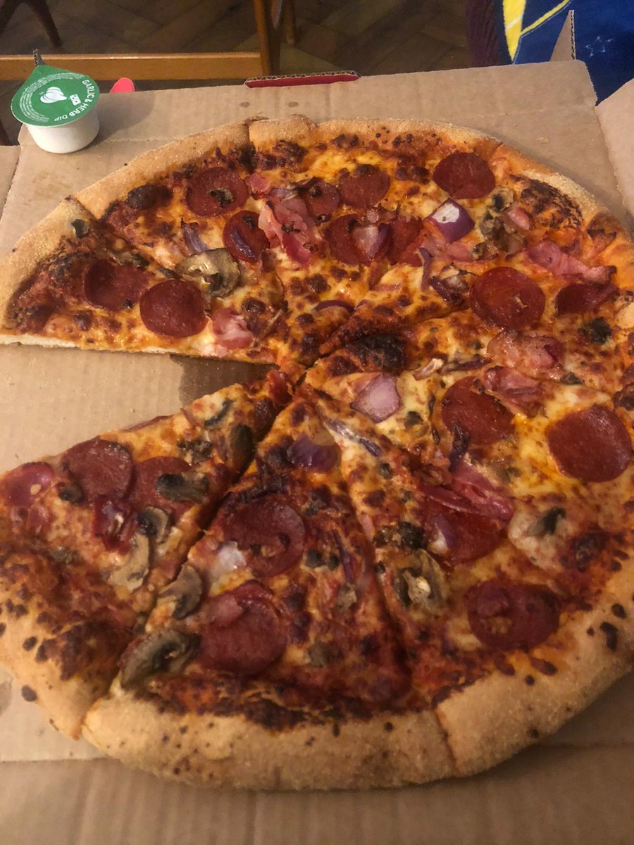 RubySambaKedge's tweet photo. @dominos burned pizza! Help! It doesn’t taste great! https://t.co/sWbokdS21M