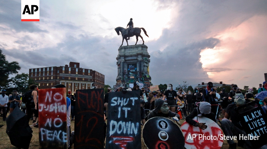 AP's tweet photo. The @AP 2020 photos of the year captured a world in distress. Following the death of George Floyd, racial justice protests erupted across the United States.

See our best photos of the year. #APPhotos2020 https://t.co/4fGmuHs8hB