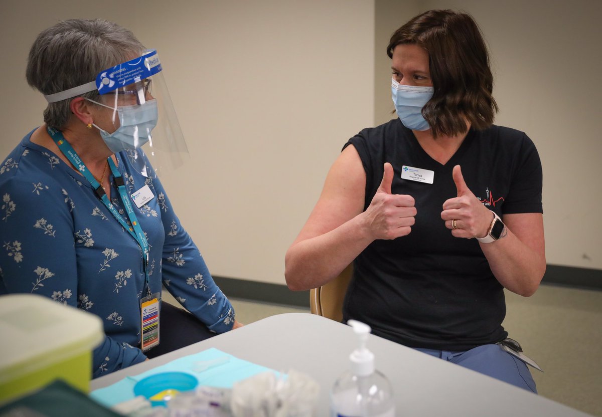 AHS_media's tweet photo. “The way that we are living right now is not how humanity is meant to exist,” says RN Tanya Harvey, first in #YYC to receive the COVID vaccine. “This is a glimmer of hope for all of Alberta. Please take your responsibility seriously &amp; get your vaccine when your time comes.” https://t.co/BLg7WWKLVw