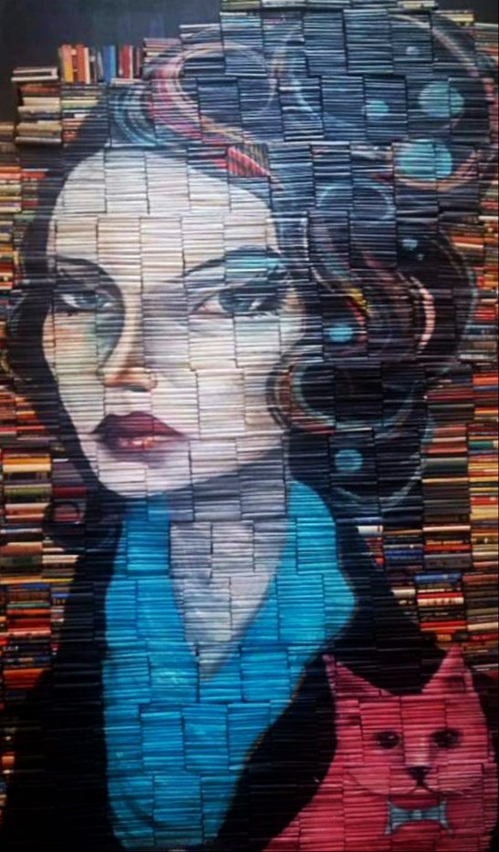 This impressive painting on discarded books was made by American artist Mike Stilkey, whose artworks have graced galleries across the US, UK, and Asia. Entitled "Discarded Romance", this 24-foot tall artwork is a permanent fixture in Fully Booked Fort towering over its atrium.