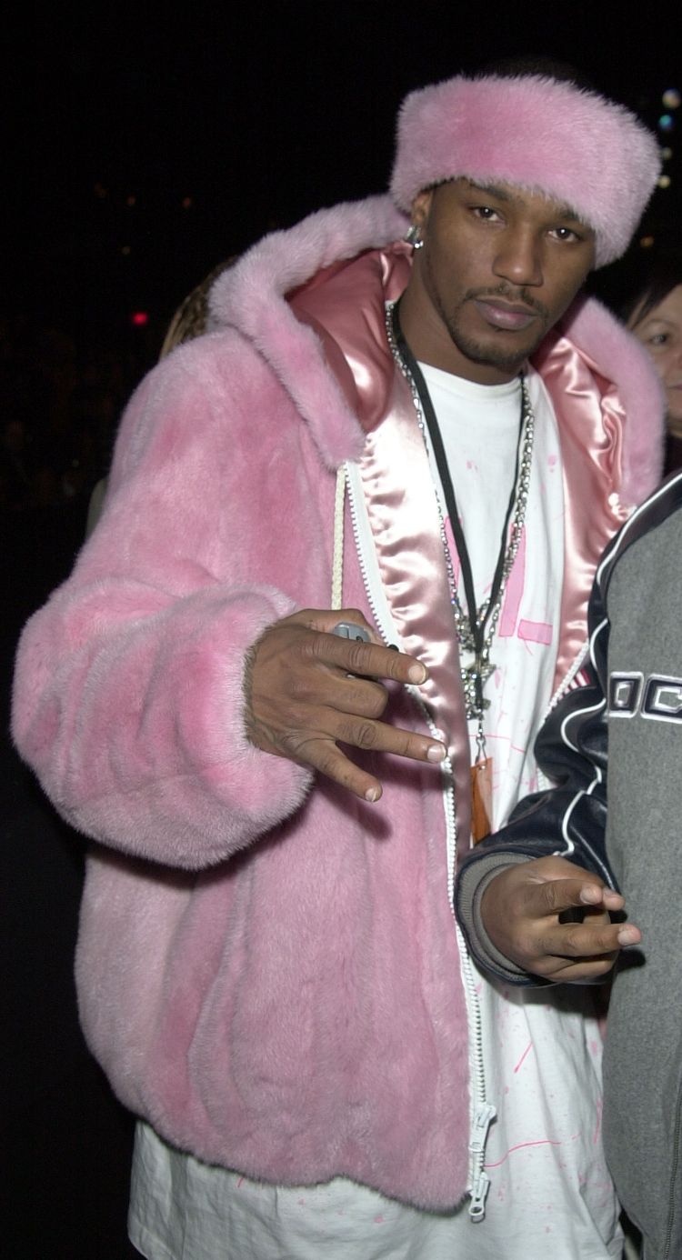 Would you rather have the Lenny Kravitz scarf of Cam's pink fur coat? 