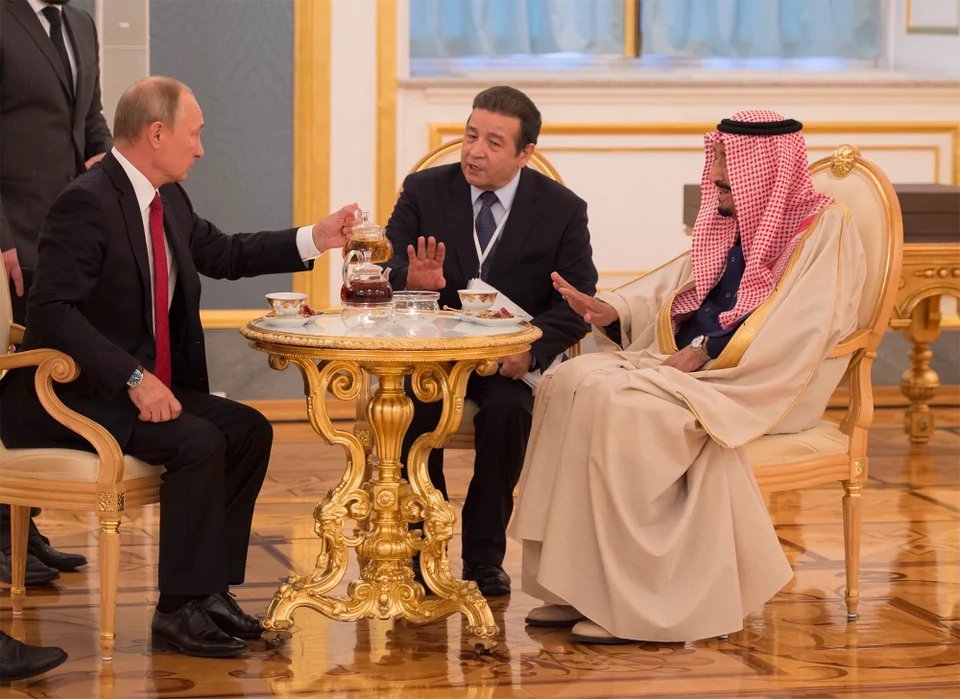 FrankLuntz's tweet photo. When Vladimir Putin offers you tea. https://t.co/hyE5YMqMMO