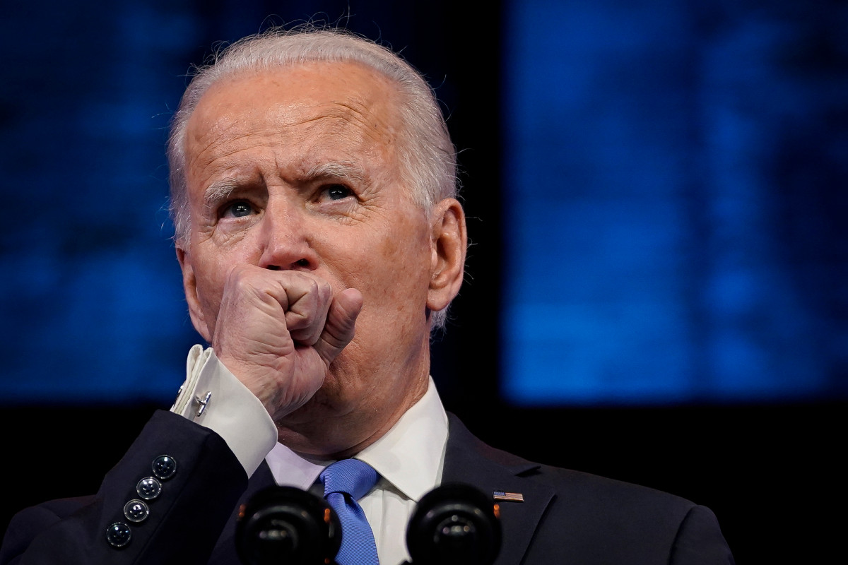Joe Biden says he has a 'bit of a cold' after coughing during speech