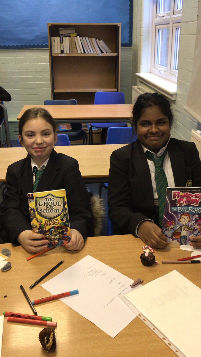 BgisEnglish's tweet photo. Year 7 pupils excited to take home their Christmas reading books from @LiteracyBgis 📚 🎄 don’t forget to fill in your reading journals!! #booksandcake https://t.co/dlNJMCf9CC