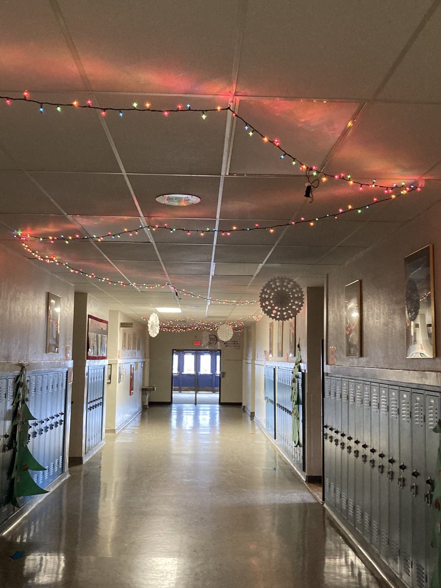 Graveraet Elementary is decorated and looking amazing for the Holidays. Dr. Kemppainen poses outside the office with one of dozens of decorations the staff made to make for a cozier environment for the students. Nice going GES!!