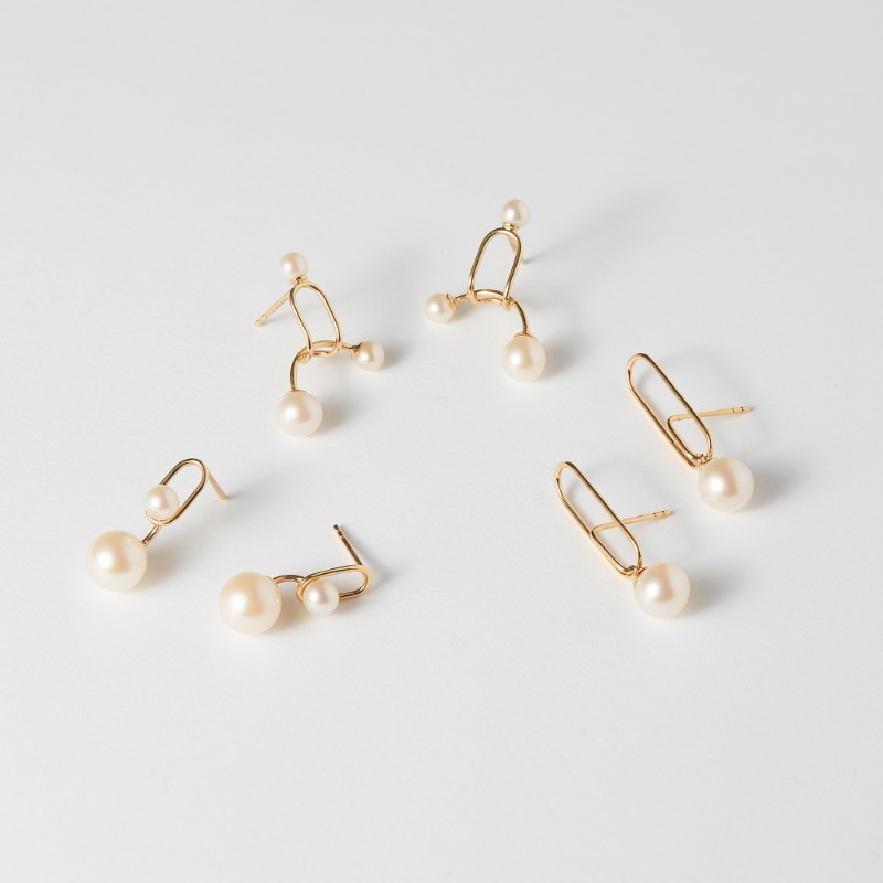 Ruifier's tweet photo. Looking for last minute gifts? Discover our collection of Astra earrings that bring together timeless pearls with modern design. #RUIFIER