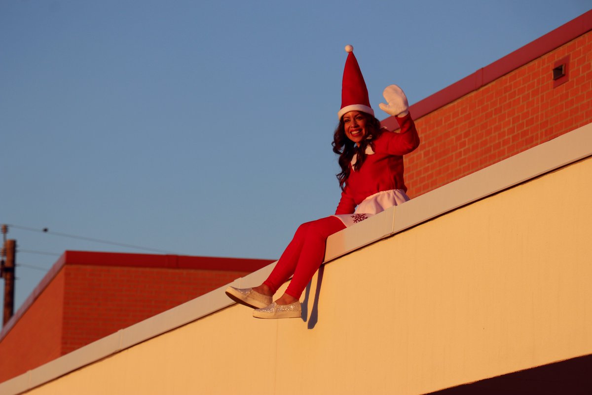 CCISD's tweet photo. Another elf on the roof spotted this morning at @CalkWilsonElem! Elf Assistant Principal Valerie Nesmith-Arechiga was all smiles wishing her students a happy holiday season. 🎄 https://t.co/NfpOeptIWM