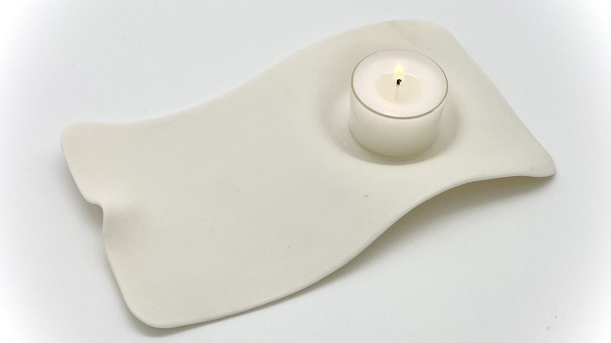 Eine Kerze anzünden und eine Auszeit nehmen.