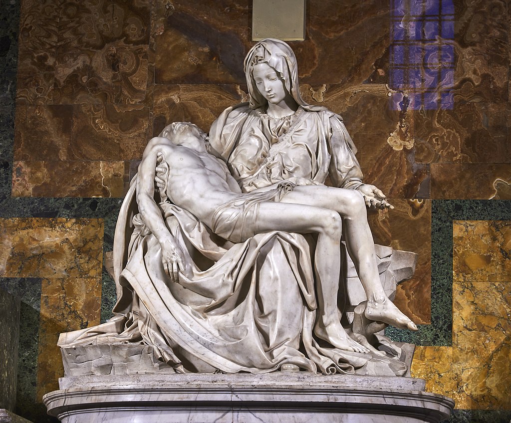 La Pietà est une statue en marbre, représentant le thème biblique de la « Vierge Marie douloureuse », tenant sur ses genoux le corps du Christ.