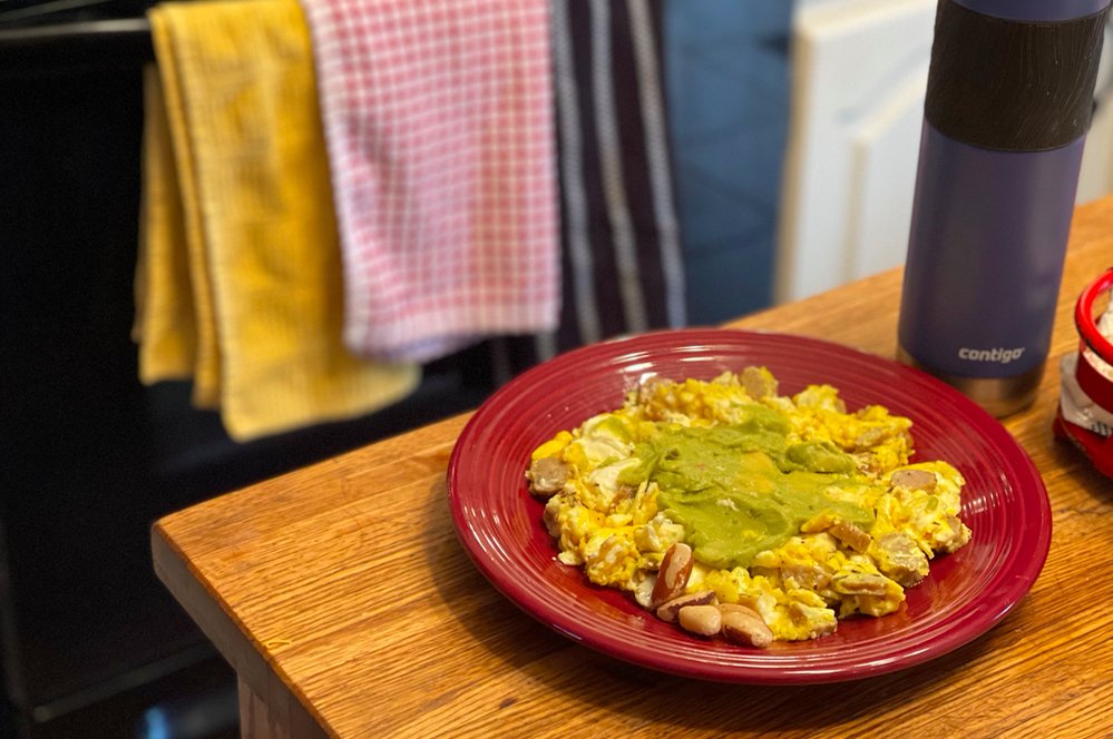 (2/8)I probably have eggs 5x per week as my first meal of the day. This concoction (4 eggs, sausage, butter, guacamole, cream cheese) is VERY  #keto. Total calories: 1,393, with 86% from fat, 11% protein and 3% carbs.