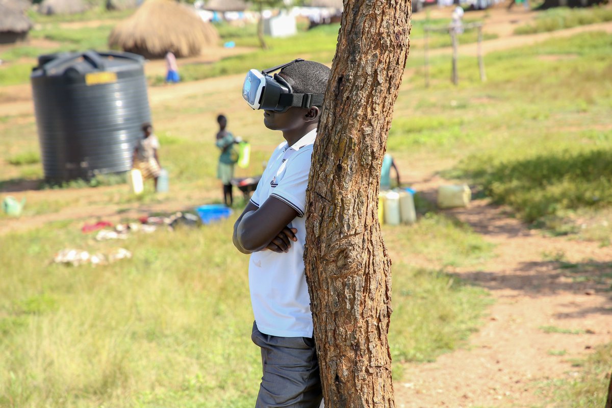 SebitMartins's tweet photo. A South Sudanese refugee in Rhino camp Uganda having moments of silence, healing, and transformation in the VR. @oculus @VRCommBuilders @GoCDC  
#SeePeace #VR4refugees #Seehappiness #Seelove https://t.co/DzQF1dn0DZ