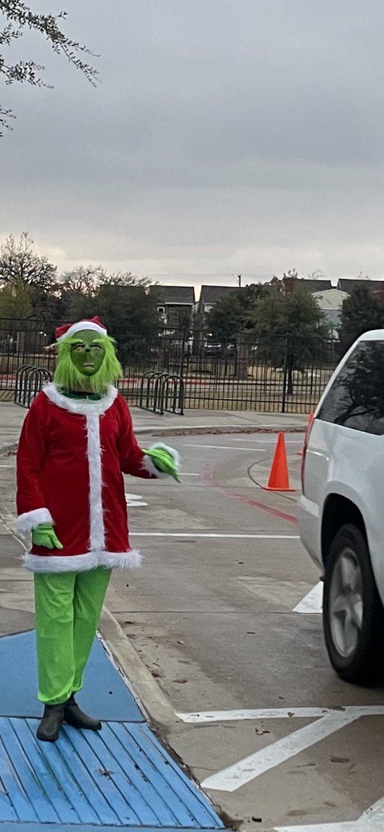 GreenLVES's tweet photo. Thank you Grinch (AKA Ms Butler) for helping out during morning duty! I’m sure your heart grew three times the original size!! ⁦@LewisvilleES⁩  ⁦@ButlerVicki⁩ https://t.co/9MQGDtnm6H