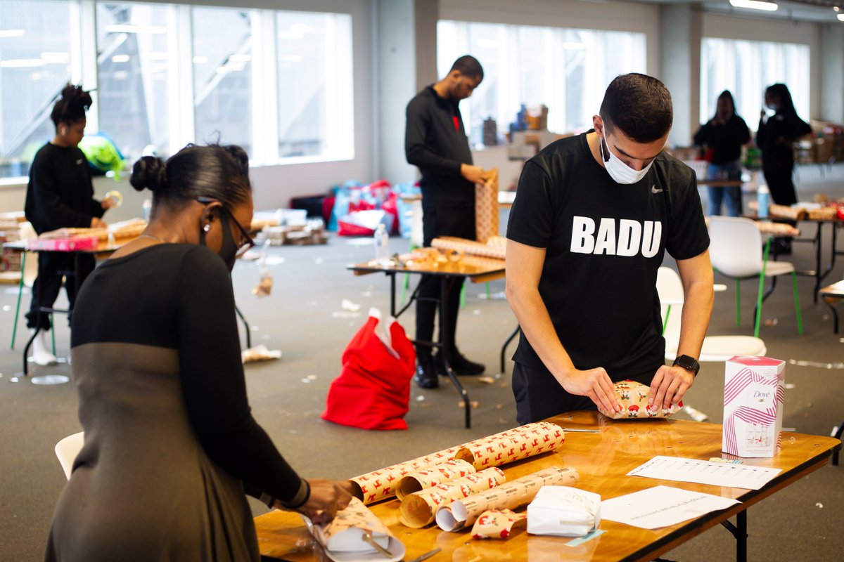BaduSports's tweet photo. Thank you to @AnntoinetteBra1 and @metecoban92 for coming down to our "That Moment When..." initiative and getting stuck in with wrapping presents and building hampers! #tmw #thebaduway https://t.co/WzB1gwK8C4
