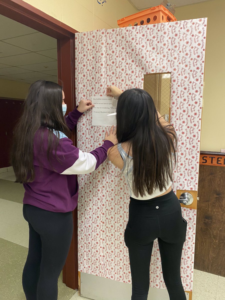 ShepHillNHS's tweet photo. On the first AND third day of Christmas the NHS gave to you...wrapping our classroom doors!!!๐ฅณ๐ฅณ #shrhs https://t.co/yjNaC4Uhj3