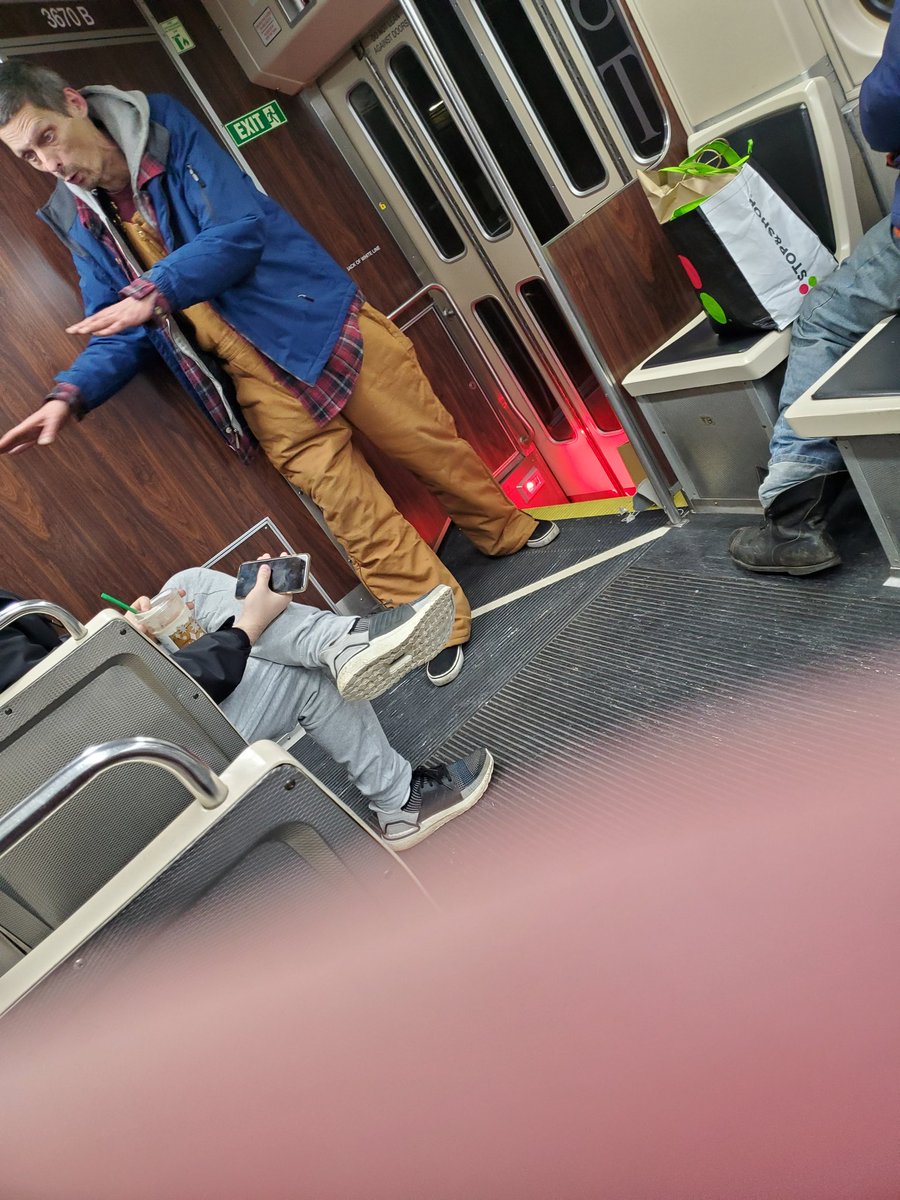 DougDeMaio's tweet photo. @MBTA dude is hacking up a lung, no mask, on a green line train. Spitting on the floor now. Great https://t.co/akWCMsPX26
