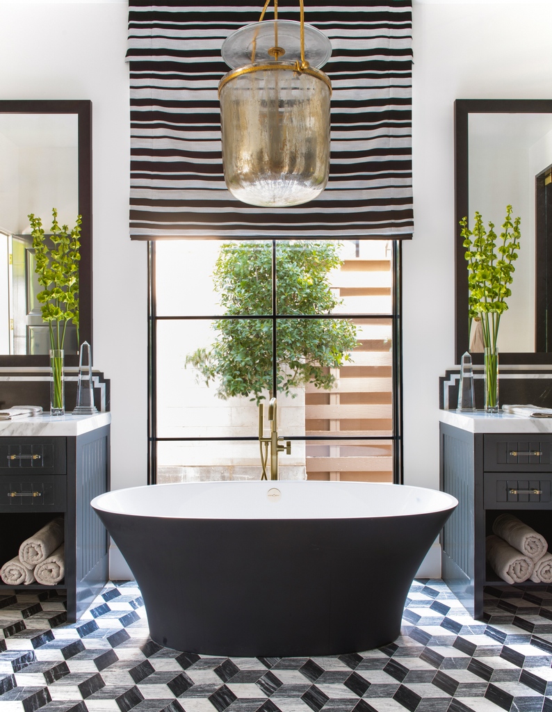 Come over to the dark side. Why not consider embracing a monochrome space with a black RAL bath? This can add depth as well as a feeling of calm neutrality. Shown here is our iconic ionian bath. Credit: Thomas James & Costa Christ Photography bit.ly/3lU1idK #baths