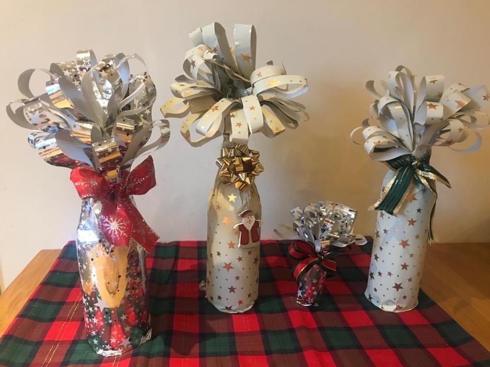 RotaryElgin's tweet photo. Rotary Elgin boasts many talented members. James demonstrated his skills at the Christmas Party. If you’re looking for novel ways to wrap your Christmas gifts then James has the answer. He led us through a ‘craft’ session to enable you to wrap bottles of wine more skilfully https://t.co/e98vBFwhZ0