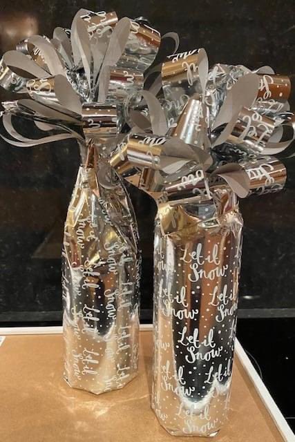RotaryElgin's tweet photo. Rotary Elgin boasts many talented members. James demonstrated his skills at the Christmas Party. If you’re looking for novel ways to wrap your Christmas gifts then James has the answer. He led us through a ‘craft’ session to enable you to wrap bottles of wine more skilfully https://t.co/e98vBFwhZ0