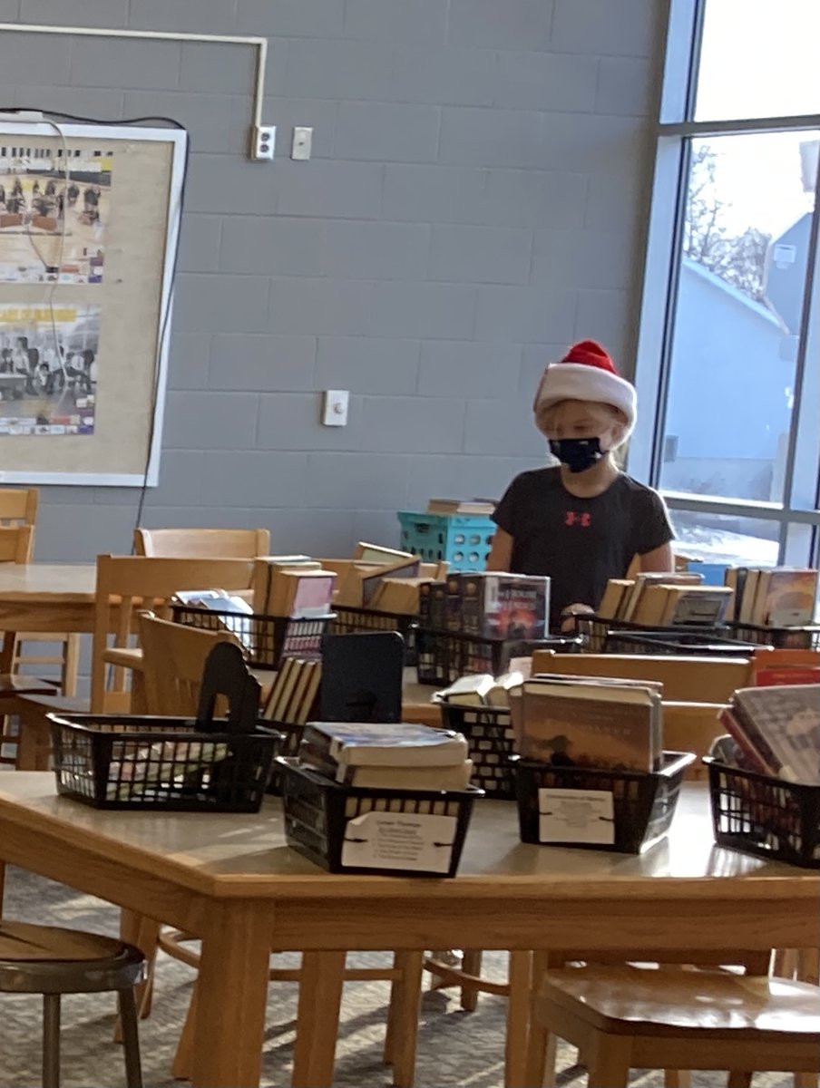 5th Graders selected fantasy books this morning for reading workshop.