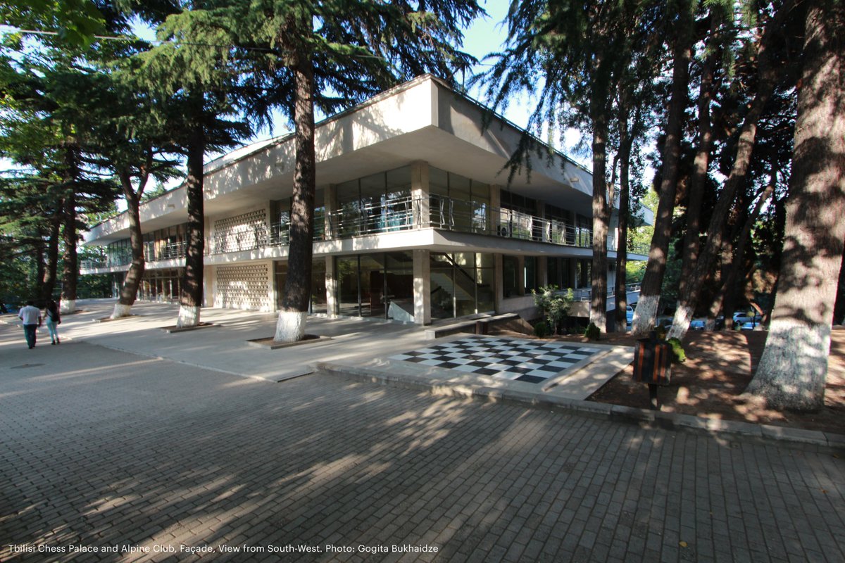 This is the Tbilisi Chess Palace and Alpine Club, a community hub in the heart of Georgia's capital city.The building harmoniously blends into an outdoor park setting and serves as an inviting center for chess and mountaineering, two of Georgia’s popular leisure activities.