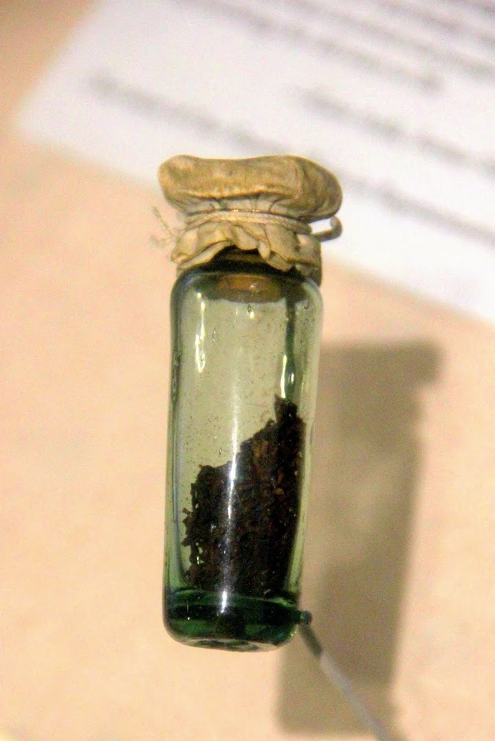 Well, there seems to be tea party tea everywhere you look, like this vial in the collection of the Old State House.
