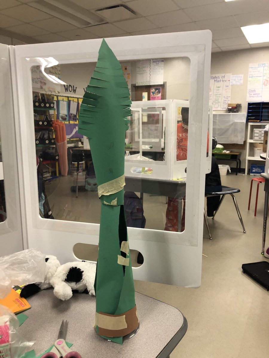 MrsGumsDIS's tweet photo. My students accepted the challenge. Who can design the tallest tree that can stand on its own? BUT you can only use 1 sheet of green paper, a cup, and a foot strand of tape. They rocked this challenge! #steam ⁦@LeaphartElem⁩ https://t.co/eK5WfqClBt