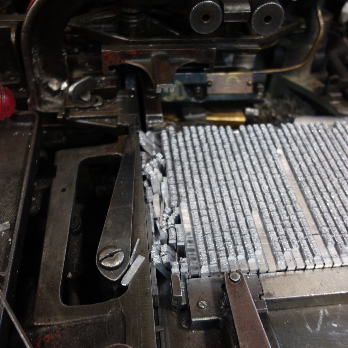 arionpress's tweet photo. This is what happens when the Monotype caster gets jammed! As you can imagine, pieces of type falling out of line can be a messy affair.
#monotype #typecaster #type https://t.co/tDpST63bRS